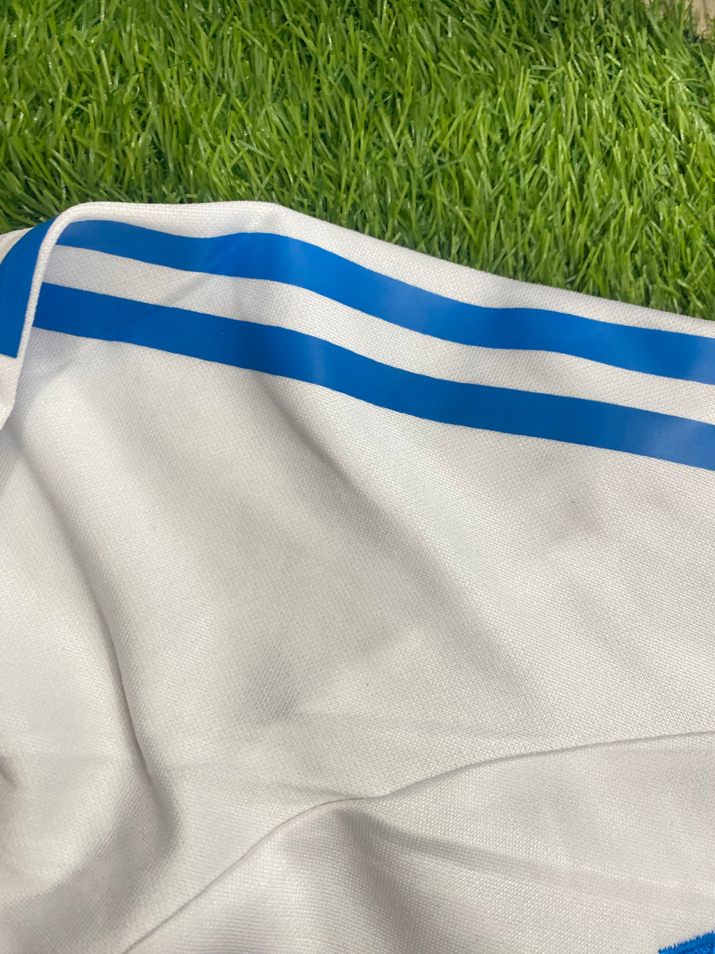 Real Madrid Tiro 2025 competition training top with thumb grip