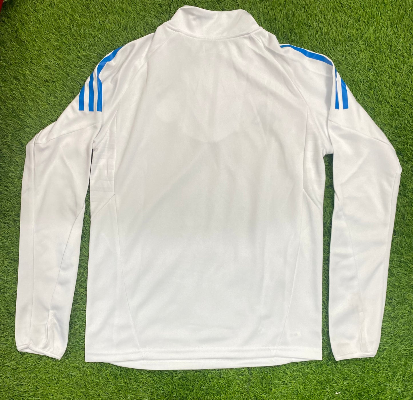 Real Madrid Tiro 2025 competition training top with thumb grip