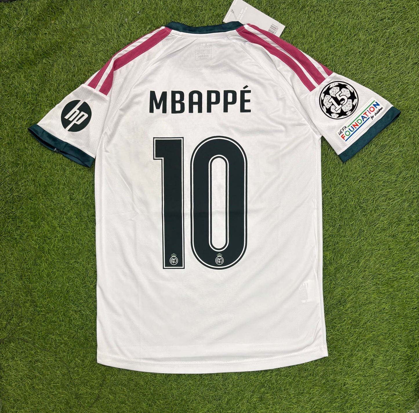 Real Madrid Home 26/27 Player version logos (Half sleeves)