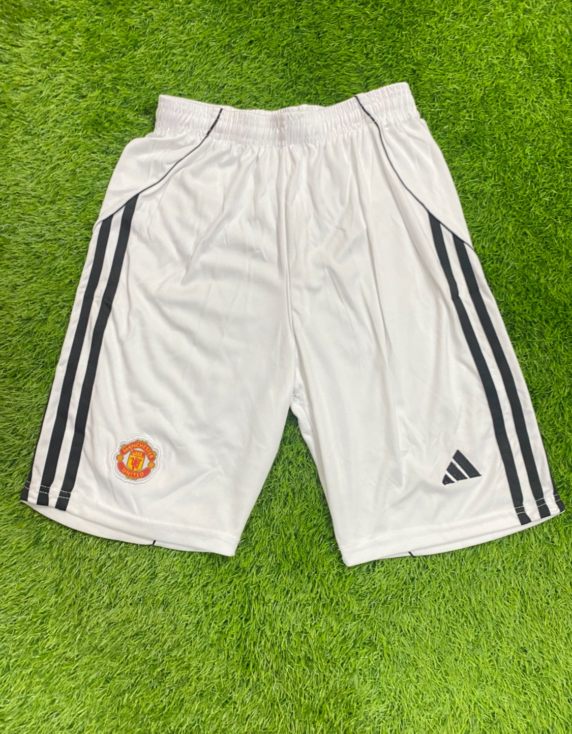 Manchester United home shorts 25/26