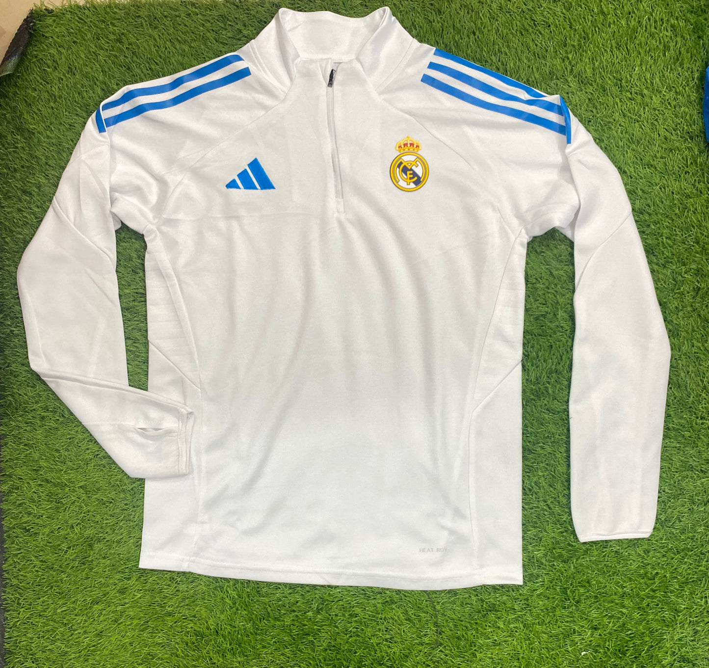 Real Madrid Tiro 2025 competition training top with thumb grip